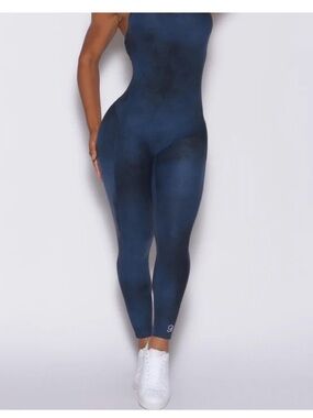 Bombshell Sportswear Navy Sculpting Sleeveless Jumpsuit plus matching shrug